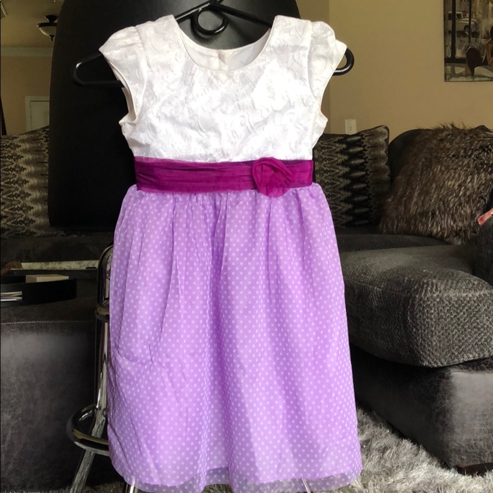 Girl’s white and purple dress with dots